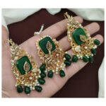 Eyption earing teeka